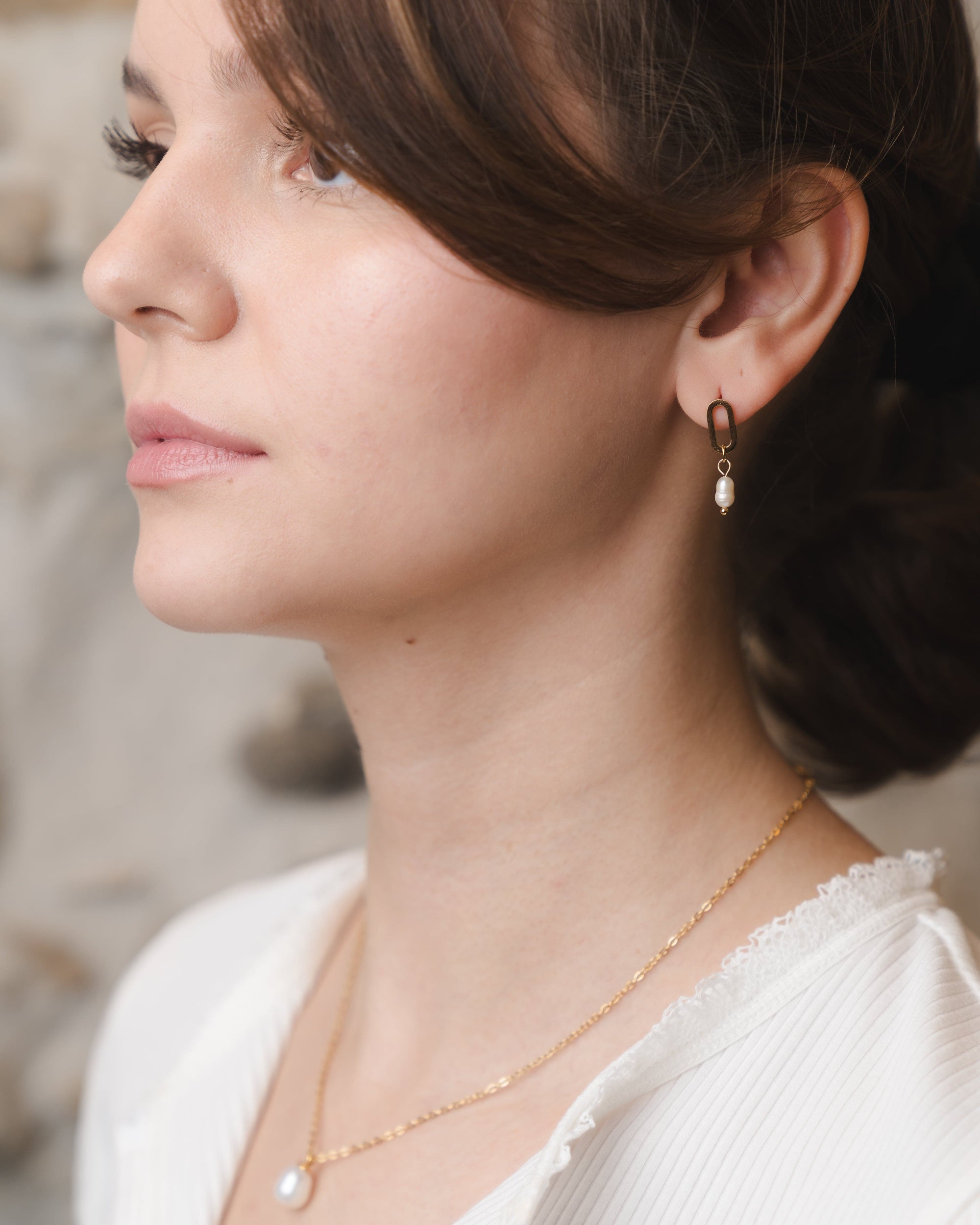 Vergoldete Ohrringe mit Perlen