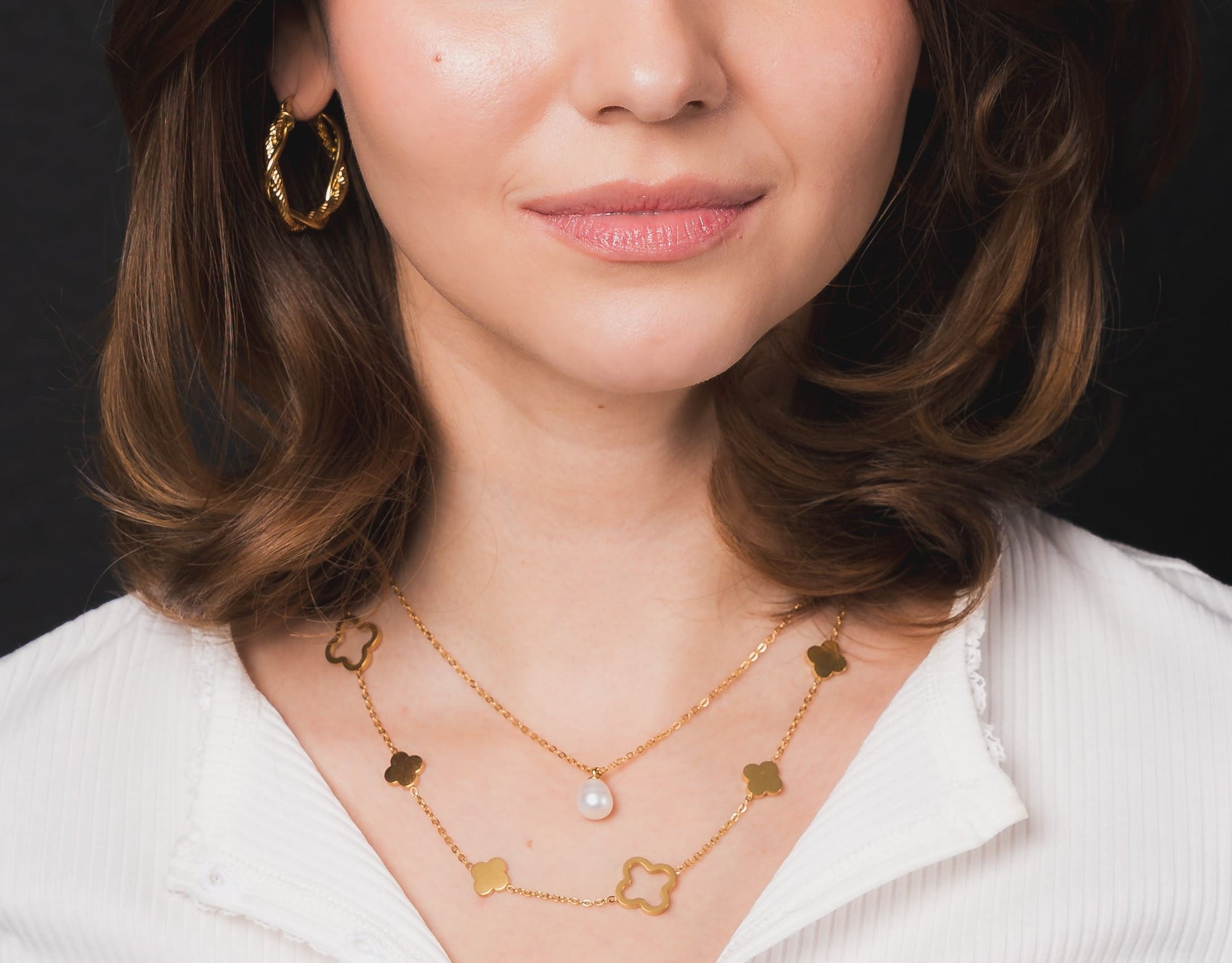 Goldene Creolen Ohrringe mit gedrehtem Design – Eleganz pur