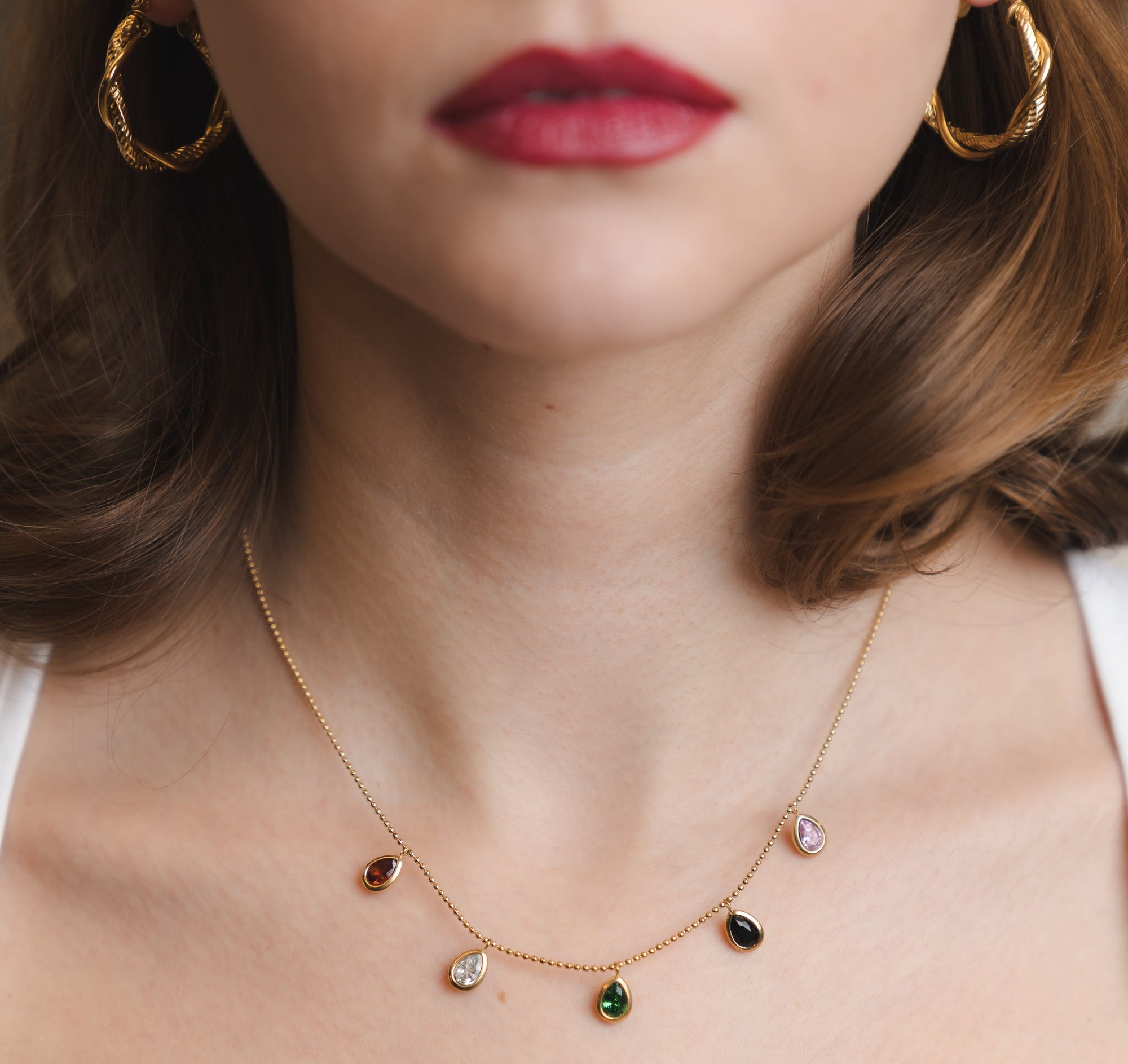 Goldene Creolen Ohrringe mit gedrehtem Design – Eleganz pur