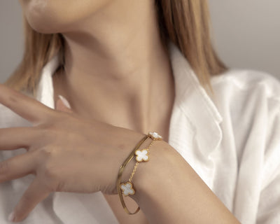 Doppelreihiges Armband Gold als Glücksbringer: Kleeblatt Motive